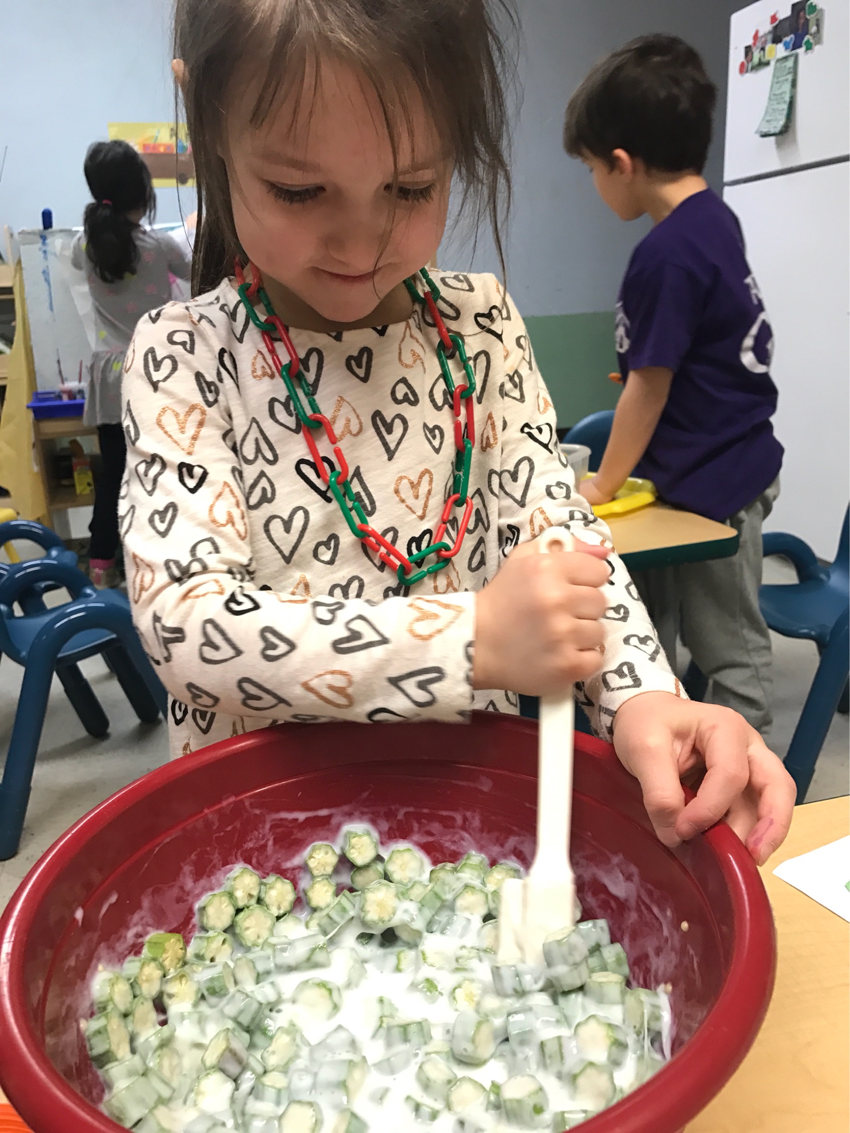 Charlie Kate prepares fried okra